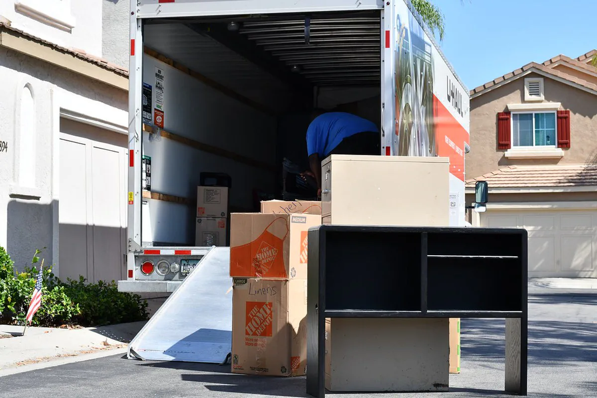 Boxes and Furniture Outside of a U-Haul