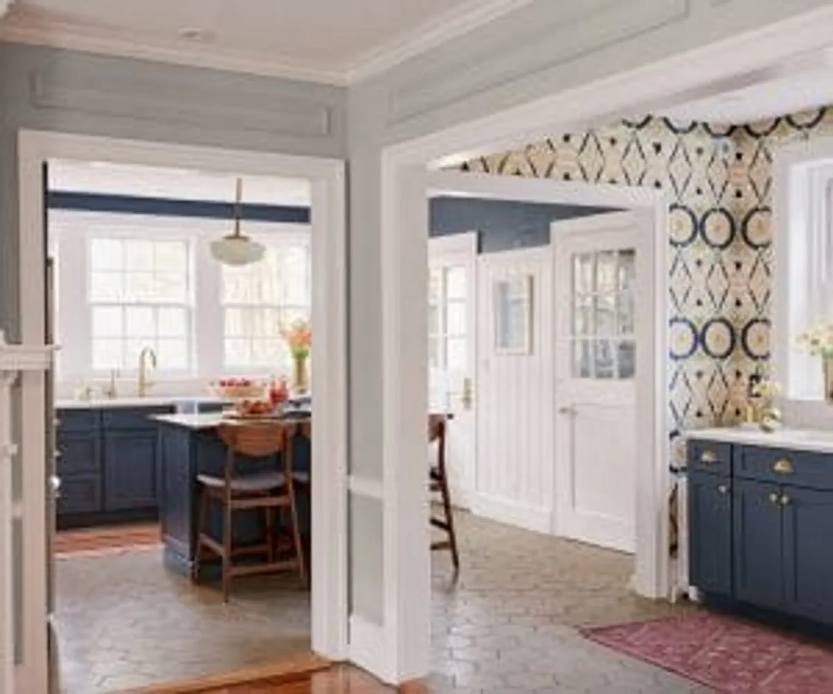 Kitchen with multiple doorways displaying casing